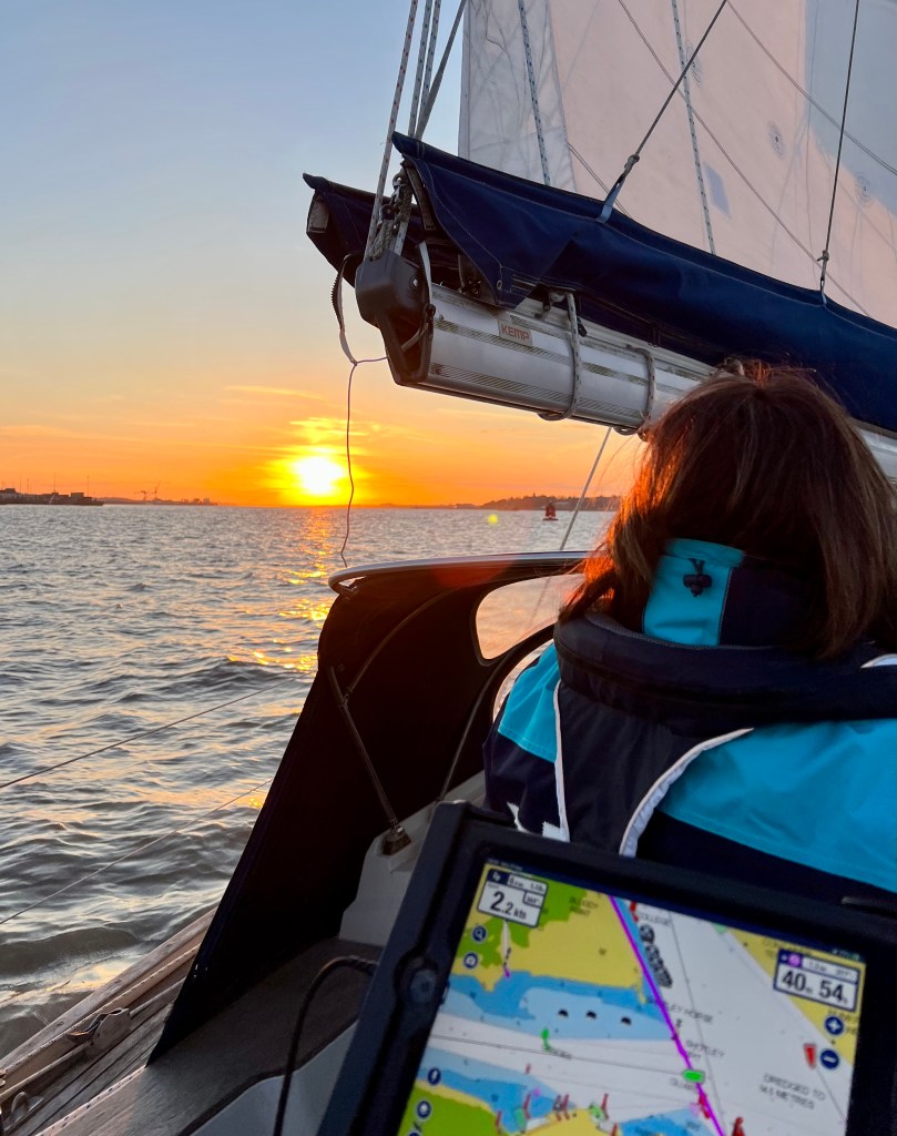 Mary enjoying the sunset, Harwich (left) and Shotley (right) at the confluence of the Orwell and Stour rivers.